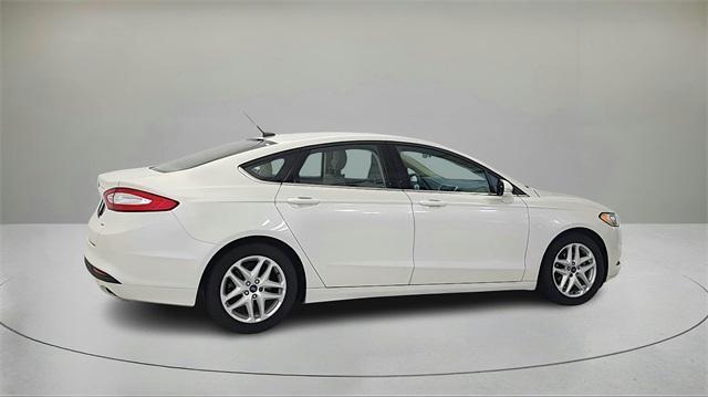 used 2014 Ford Fusion car, priced at $9,799