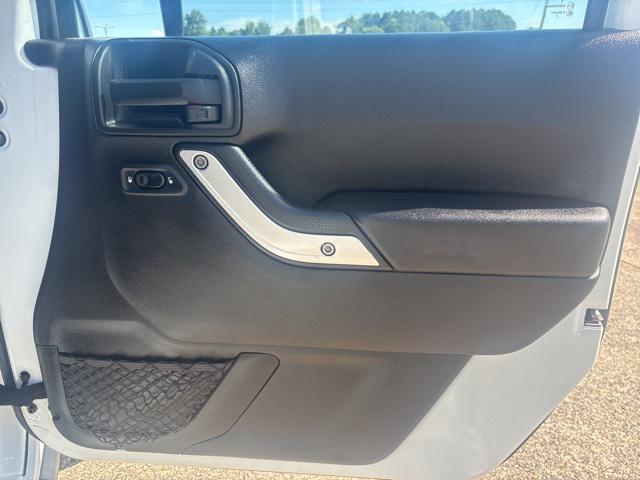 used 2015 Jeep Wrangler Unlimited car, priced at $19,397