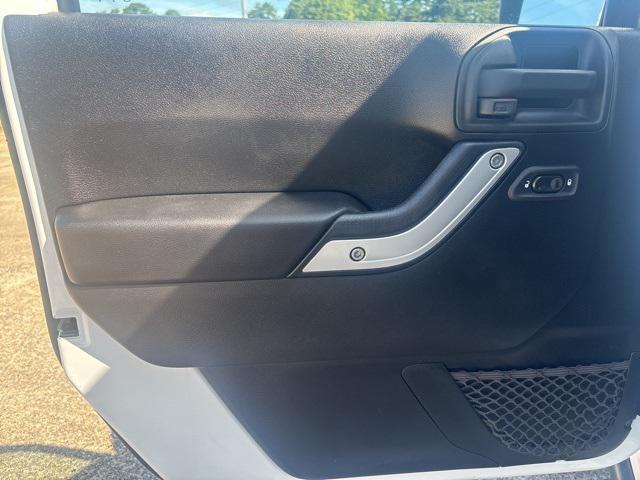 used 2015 Jeep Wrangler Unlimited car, priced at $19,397
