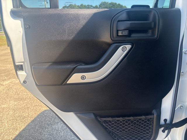 used 2015 Jeep Wrangler Unlimited car, priced at $19,397