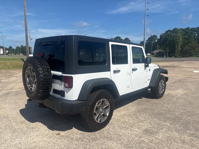 used 2015 Jeep Wrangler Unlimited car, priced at $19,397