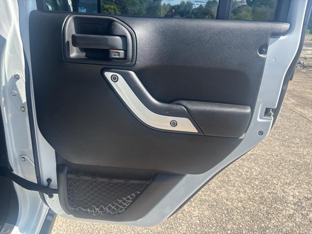 used 2015 Jeep Wrangler Unlimited car, priced at $19,397