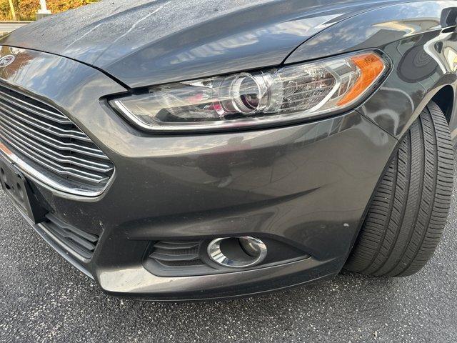used 2015 Ford Fusion car, priced at $14,000