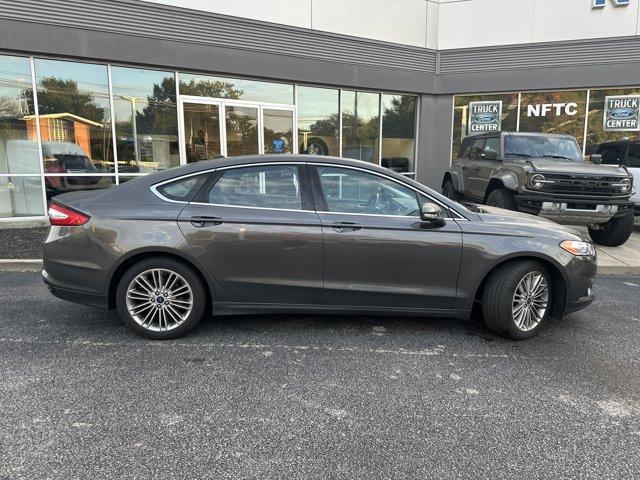 used 2015 Ford Fusion car, priced at $14,000
