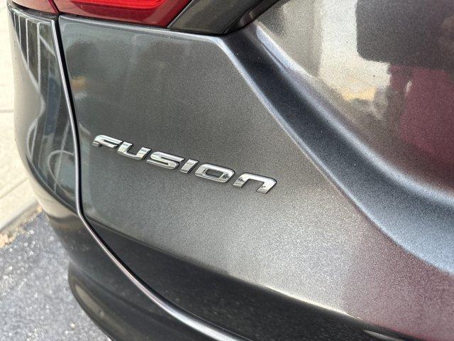 used 2015 Ford Fusion car, priced at $14,000