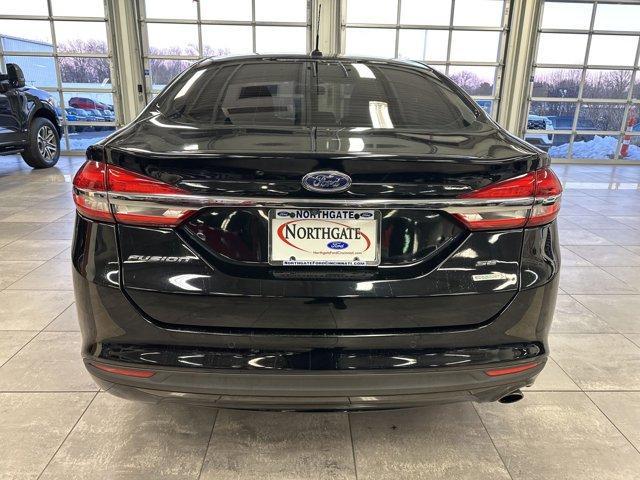 used 2017 Ford Fusion car, priced at $14,000