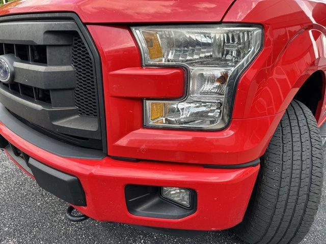 used 2015 Ford F-150 car, priced at $15,000
