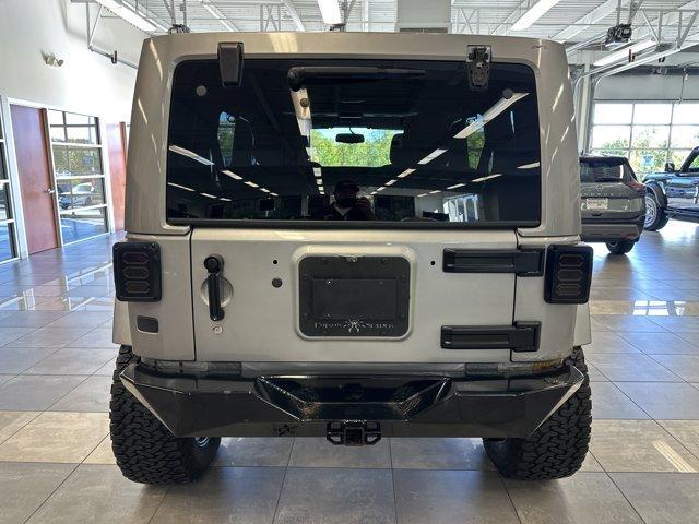 used 2013 Jeep Wrangler Unlimited car, priced at $16,500