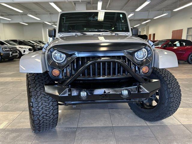 used 2013 Jeep Wrangler Unlimited car, priced at $16,500
