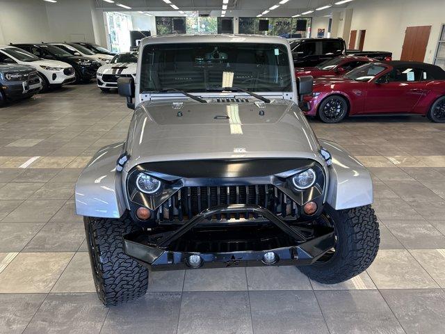 used 2013 Jeep Wrangler Unlimited car, priced at $16,500