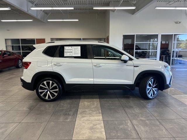 used 2024 Volkswagen Taos car, priced at $25,000