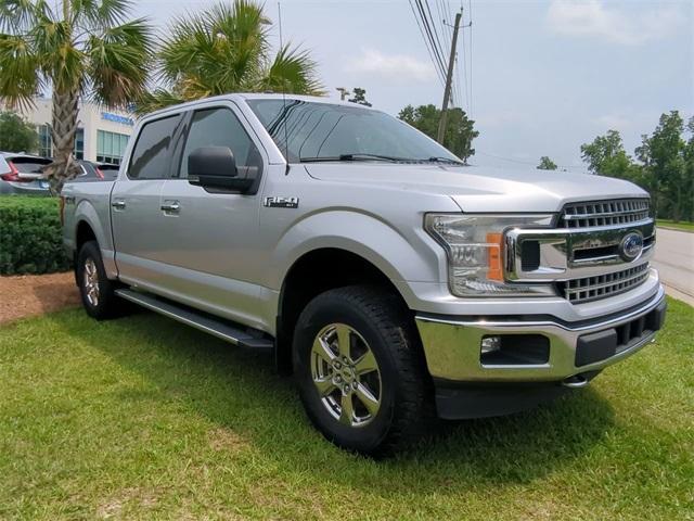 used 2018 Ford F-150 car, priced at $23,882