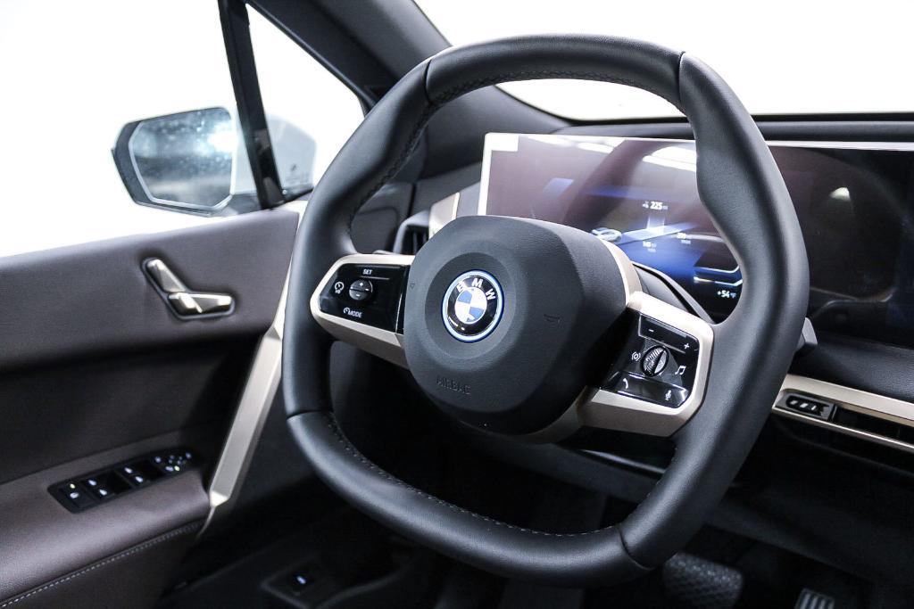 new 2025 BMW iX car, priced at $91,575