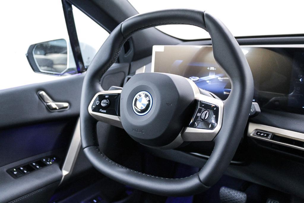 new 2025 BMW iX car, priced at $91,095