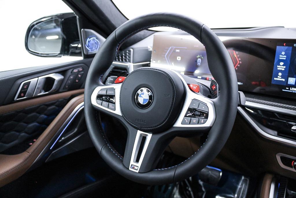 new 2025 BMW X6 M car, priced at $142,575