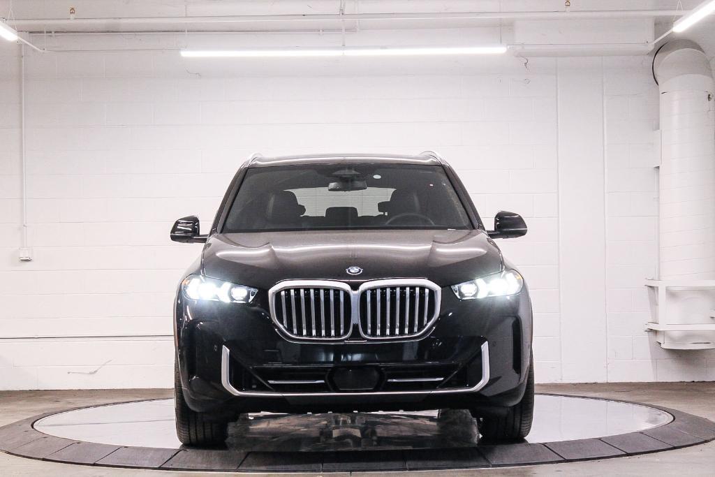 new 2025 BMW X5 PHEV car, priced at $77,875