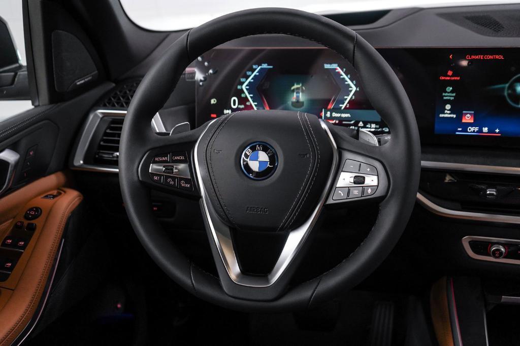 new 2025 BMW X5 PHEV car, priced at $79,245