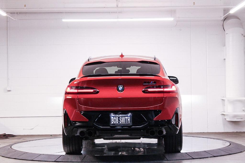 new 2025 BMW X4 M car, priced at $91,875