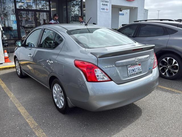 used 2014 Nissan Versa car, priced at $10,995
