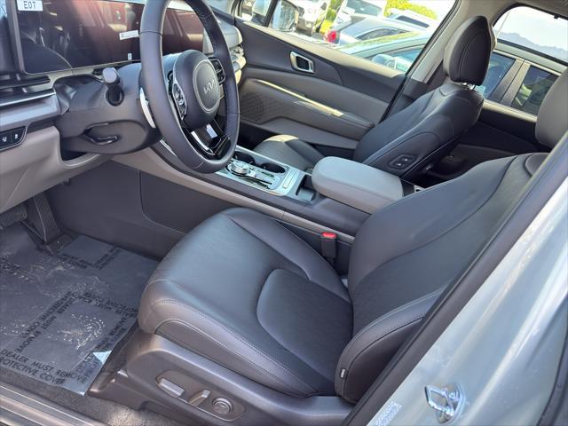 new 2025 Kia Carnival Hybrid car, priced at $44,799