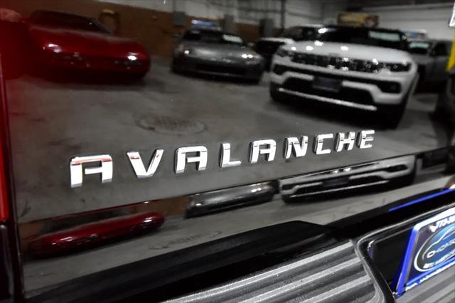 used 2013 Chevrolet Avalanche car, priced at $29,988