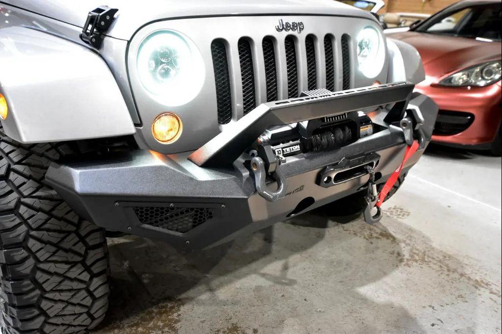 used 2015 Jeep Wrangler Unlimited car, priced at $23,771