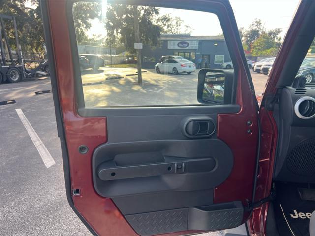 used 2010 Jeep Wrangler Unlimited car, priced at $13,990