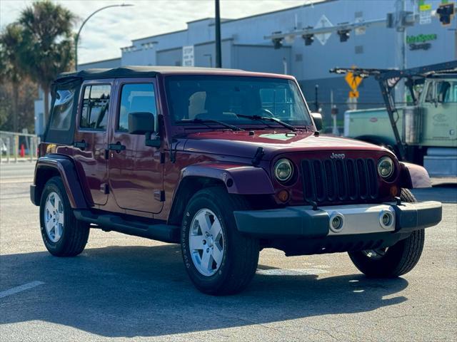 used 2010 Jeep Wrangler Unlimited car, priced at $13,990