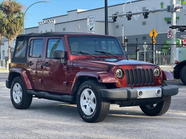 used 2010 Jeep Wrangler Unlimited car, priced at $13,990