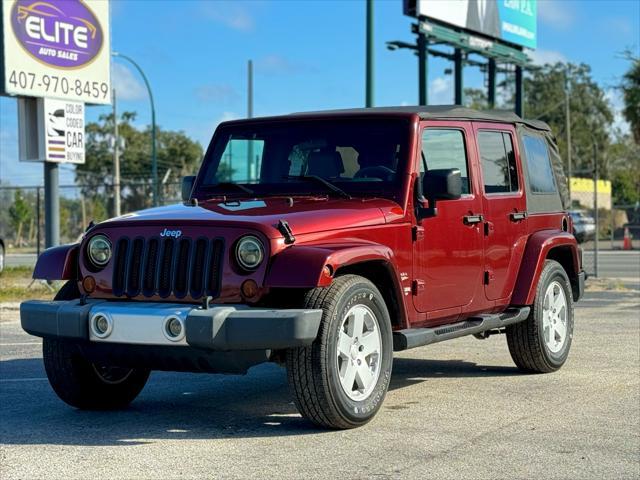 used 2010 Jeep Wrangler Unlimited car, priced at $13,990