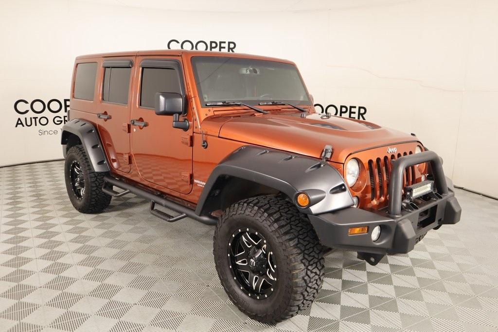 used 2014 Jeep Wrangler Unlimited car, priced at $19,880