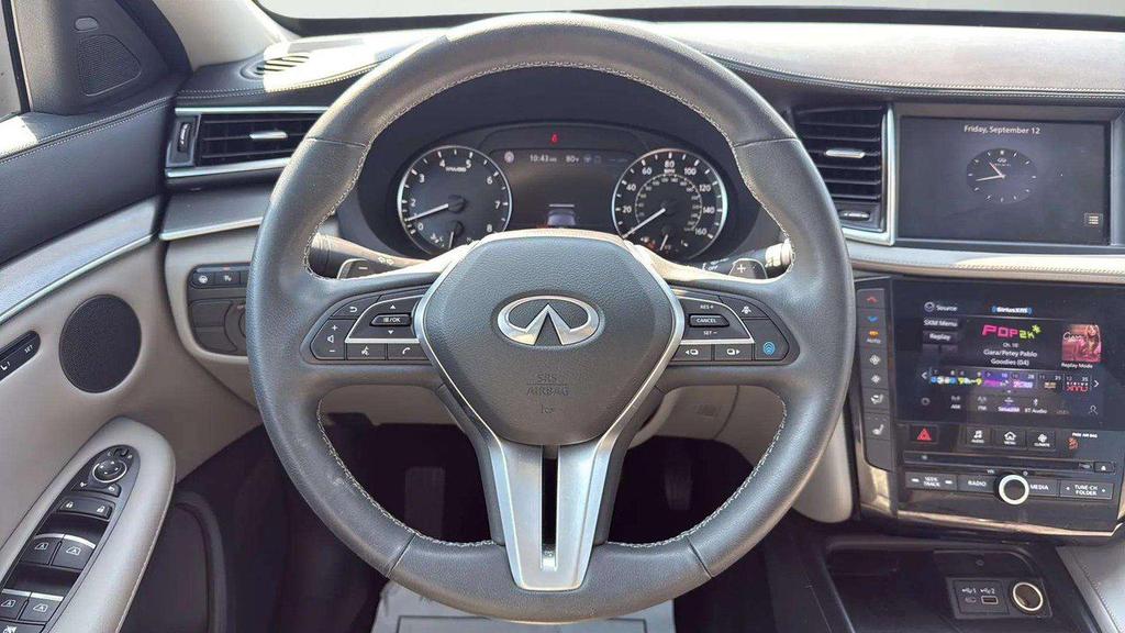 used 2023 INFINITI QX50 car, priced at $31,982