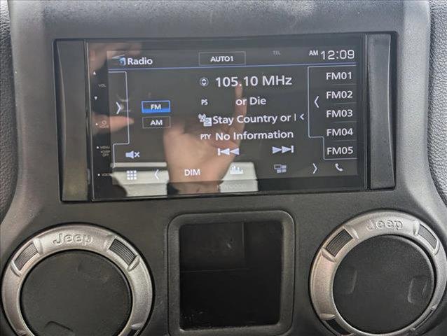 used 2017 Jeep Wrangler Unlimited car, priced at $17,455