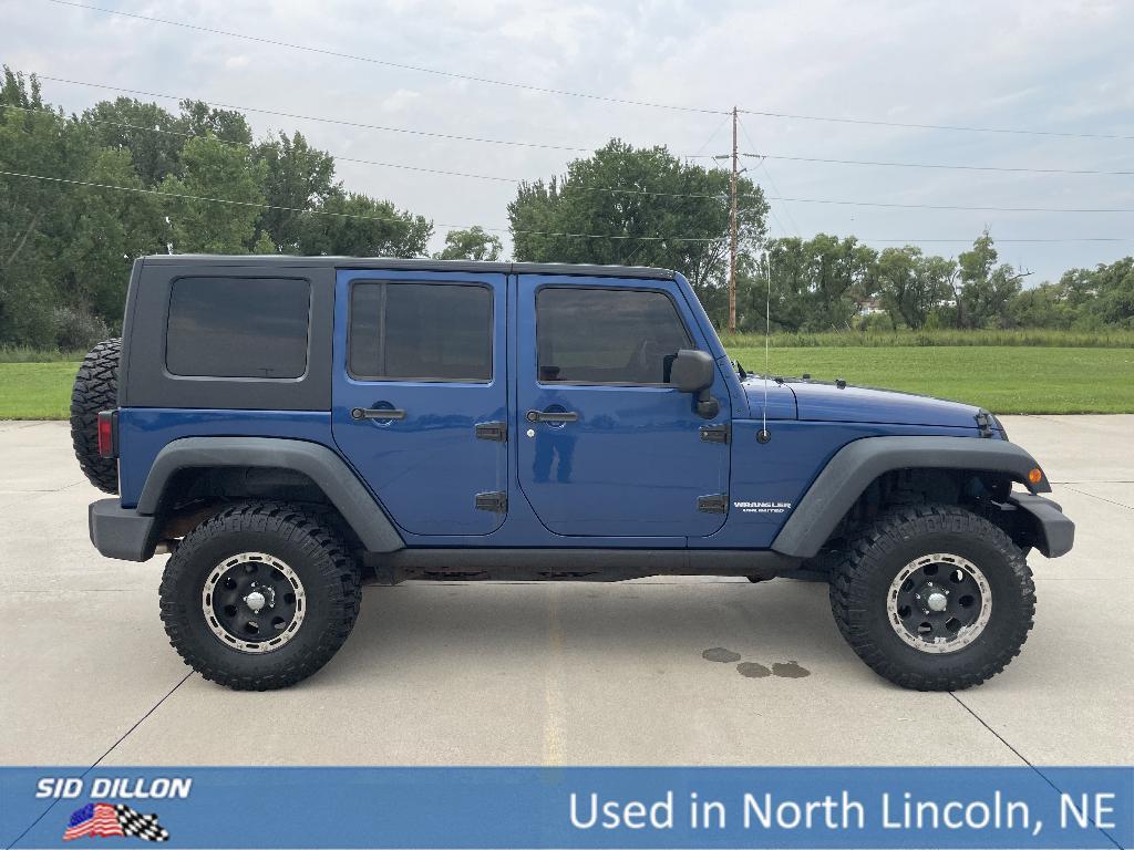 used 2010 Jeep Wrangler Unlimited car, priced at $19,892