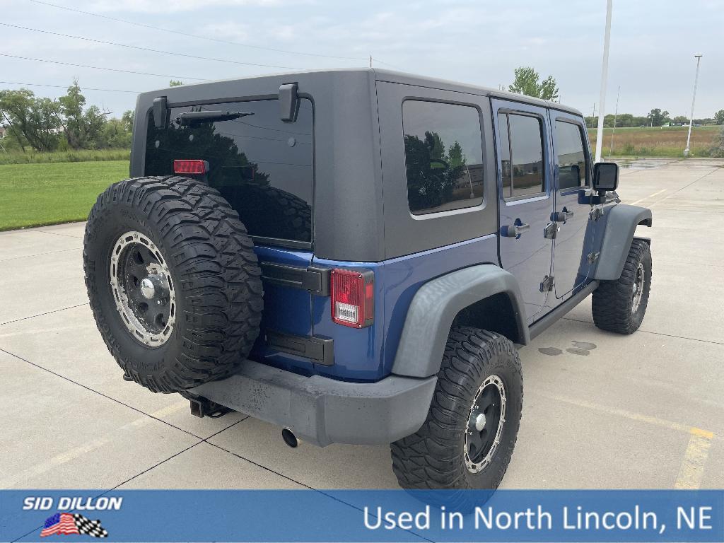 used 2010 Jeep Wrangler Unlimited car, priced at $19,892