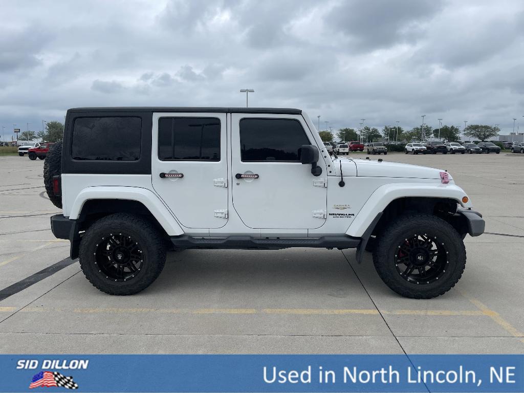 used 2015 Jeep Wrangler Unlimited car, priced at $20,991