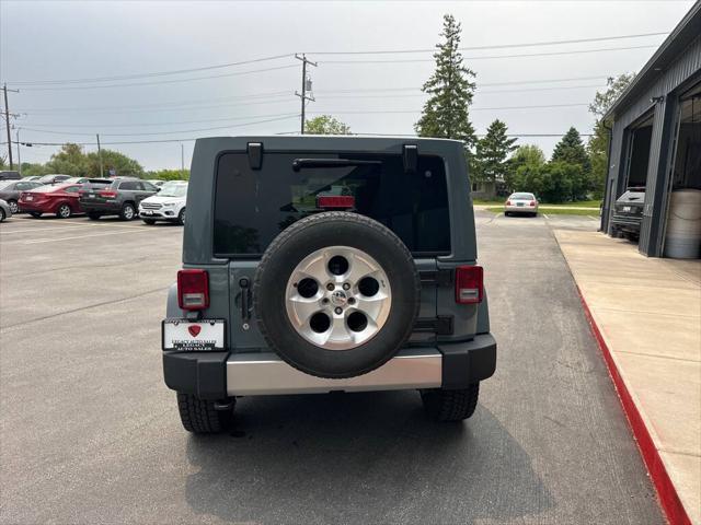 used 2015 Jeep Wrangler Unlimited car, priced at $17,999