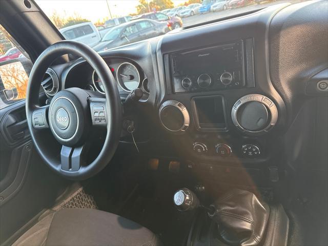 used 2014 Jeep Wrangler car, priced at $14,955