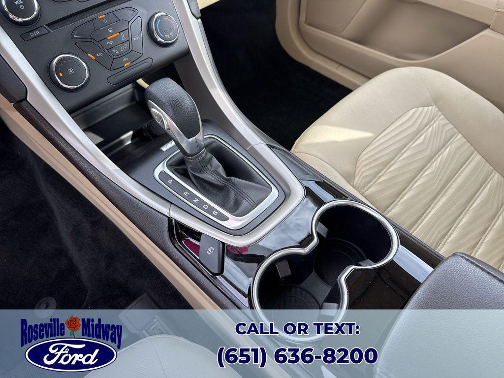 used 2016 Ford Fusion car, priced at $12,069