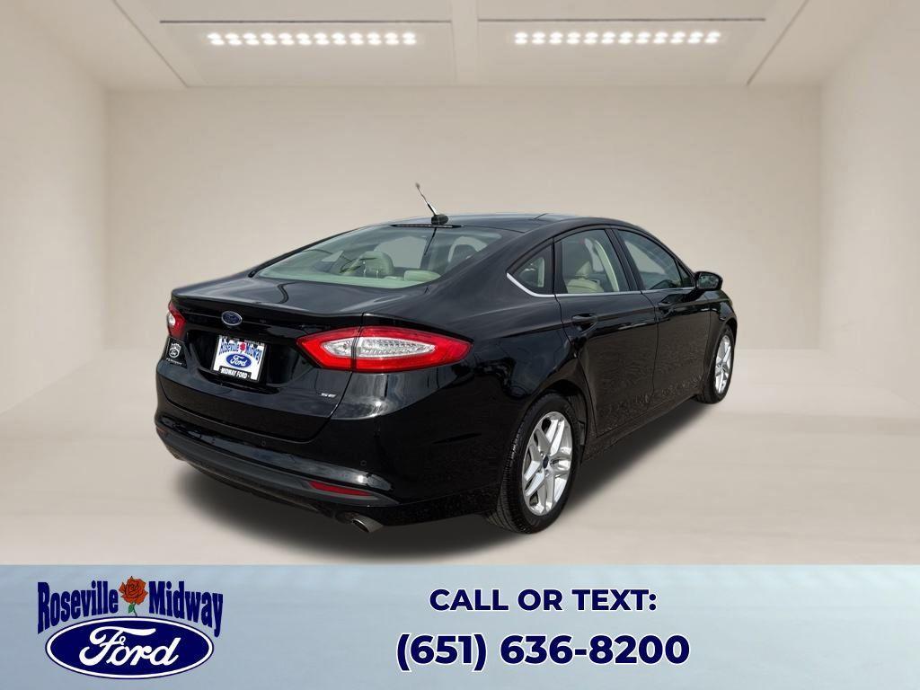 used 2016 Ford Fusion car, priced at $12,069