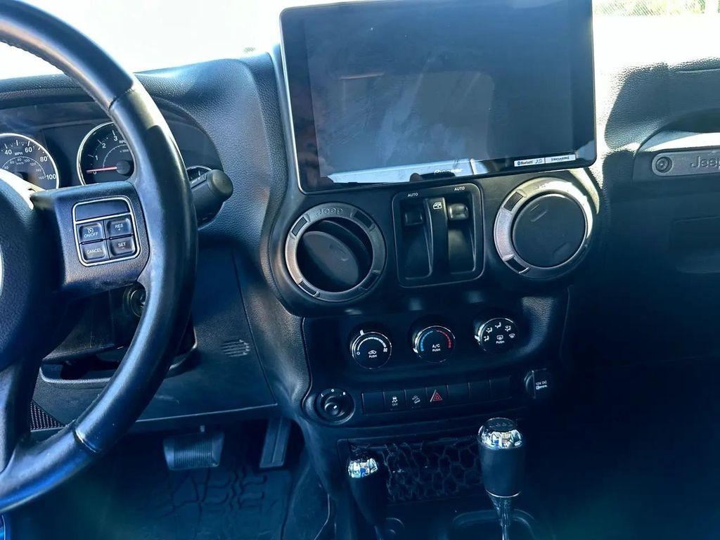 used 2015 Jeep Wrangler car, priced at $17,995