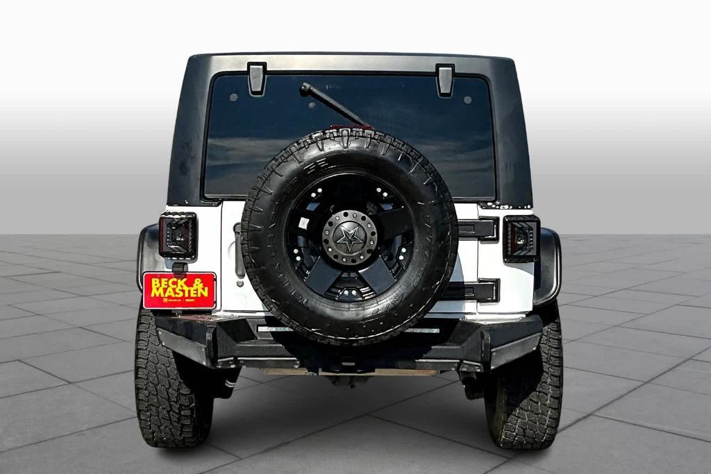 used 2014 Jeep Wrangler Unlimited car, priced at $19,997