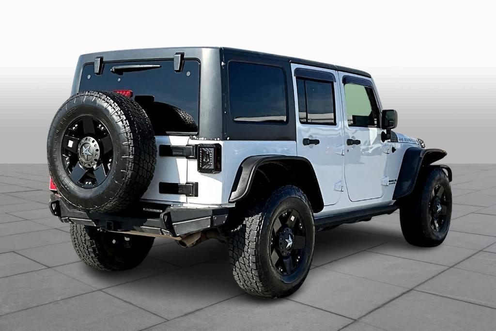 used 2014 Jeep Wrangler Unlimited car, priced at $19,997