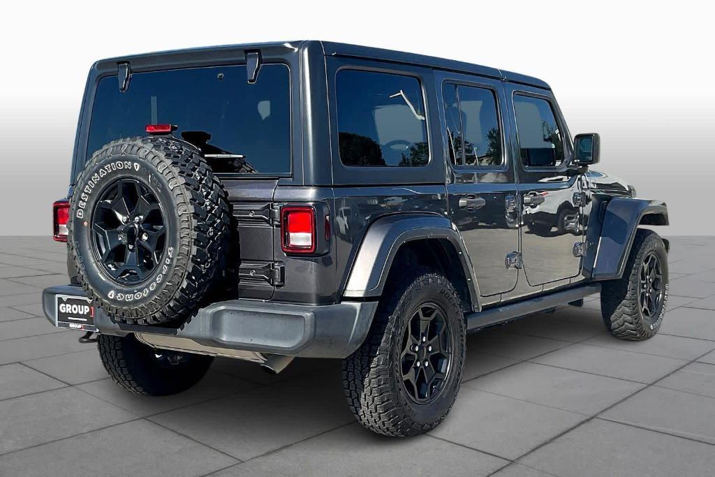 used 2023 Jeep Wrangler car, priced at $29,997