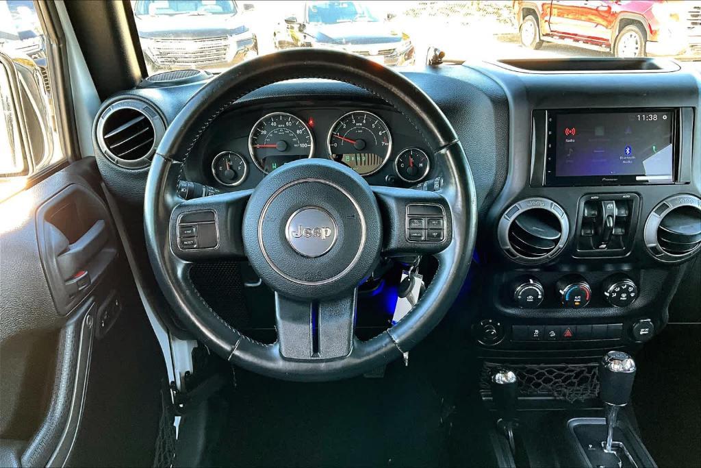 used 2015 Jeep Wrangler Unlimited car, priced at $19,997