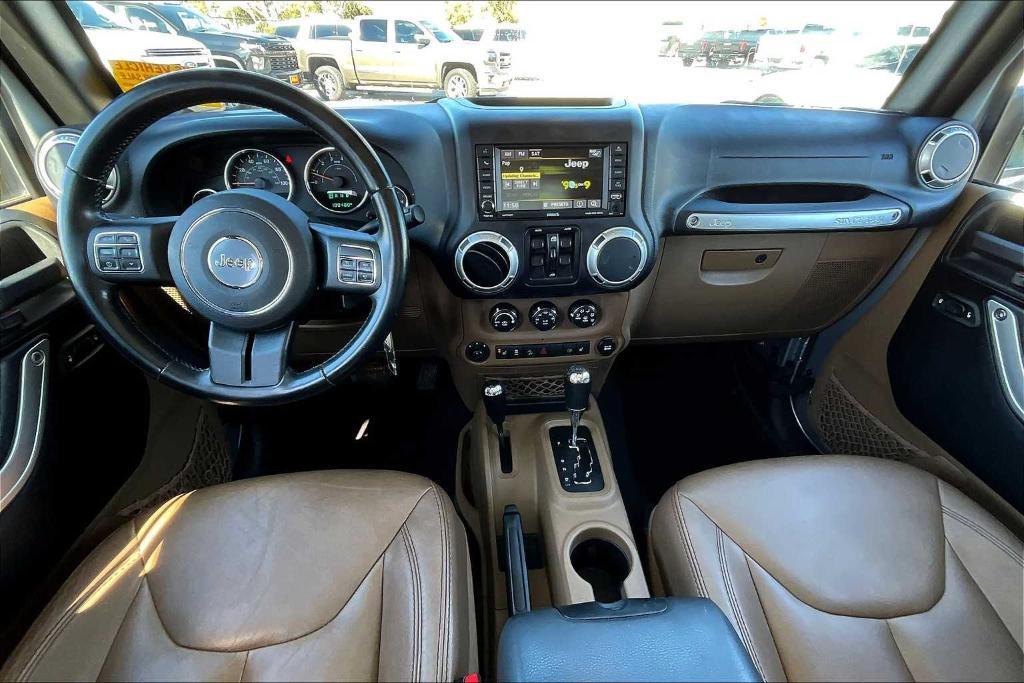 used 2015 Jeep Wrangler Unlimited car, priced at $18,845