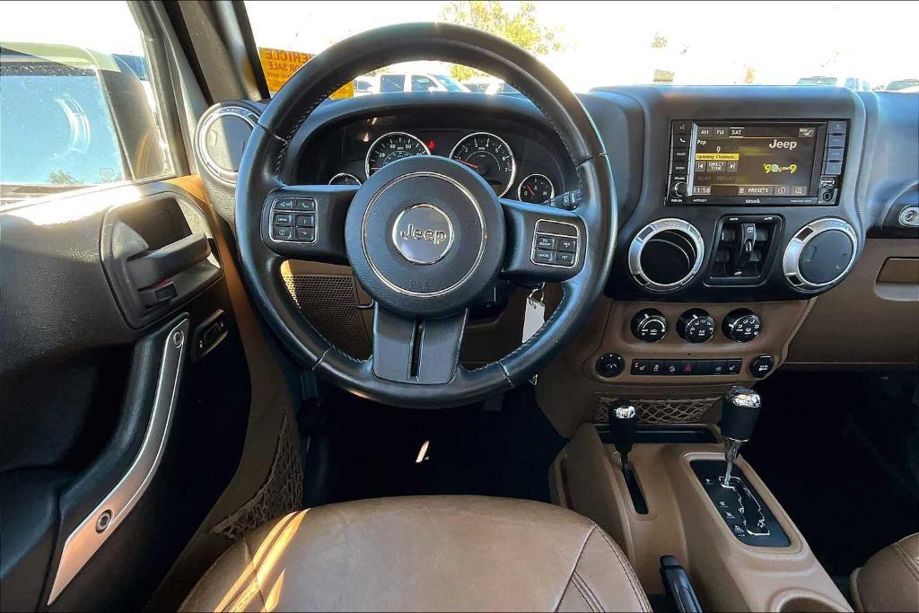 used 2015 Jeep Wrangler Unlimited car, priced at $18,845