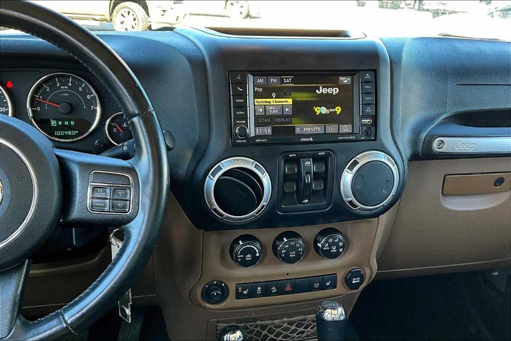 used 2015 Jeep Wrangler Unlimited car, priced at $18,845