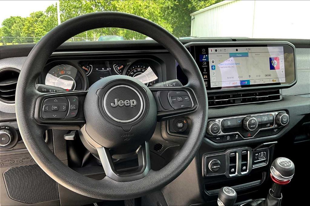 used 2025 Jeep Wrangler car, priced at $32,997