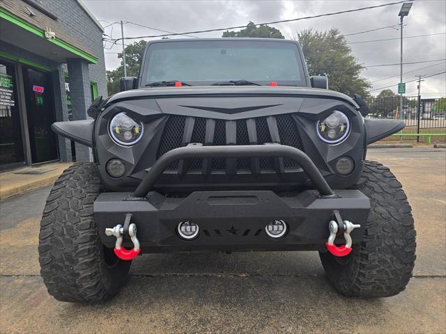 used 2014 Jeep Wrangler car, priced at $18,499